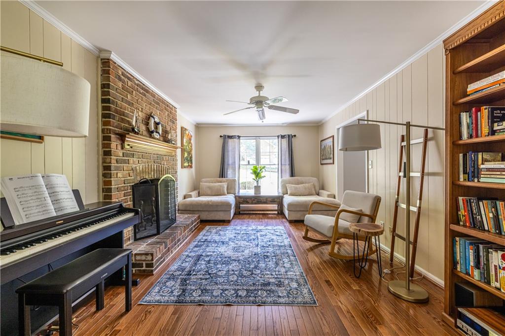 3598 Hidden Acres Drive Atlanta, GA 30340 - Photo 6 of 23 a living room with furniture and a fireplace