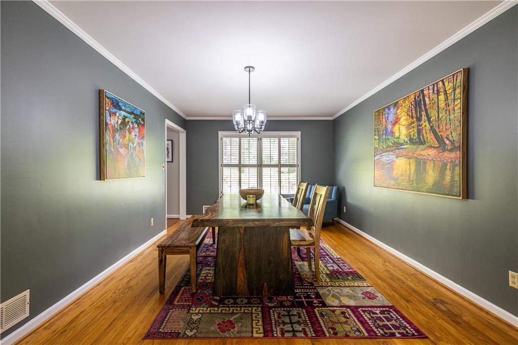 3598 Hidden Acres Drive Atlanta, GA 30340 - Photo 9 of 23 a view of a dining room with furniture window and wooden floor