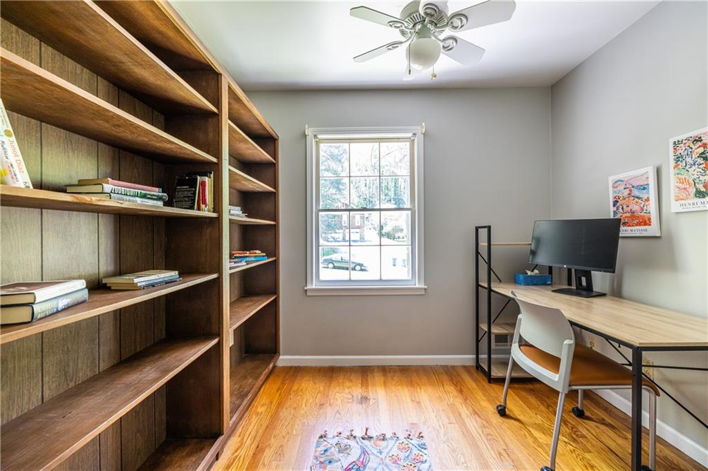 3598 Hidden Acres Drive Atlanta, GA 30340 - Photo 10 of 23 a view of a workspace with furniture and a window