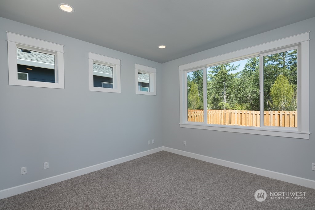 2720 Arrowroot Street Southeast Lacey, WA 98513 - Photo 6 of 18 an empty room with a window