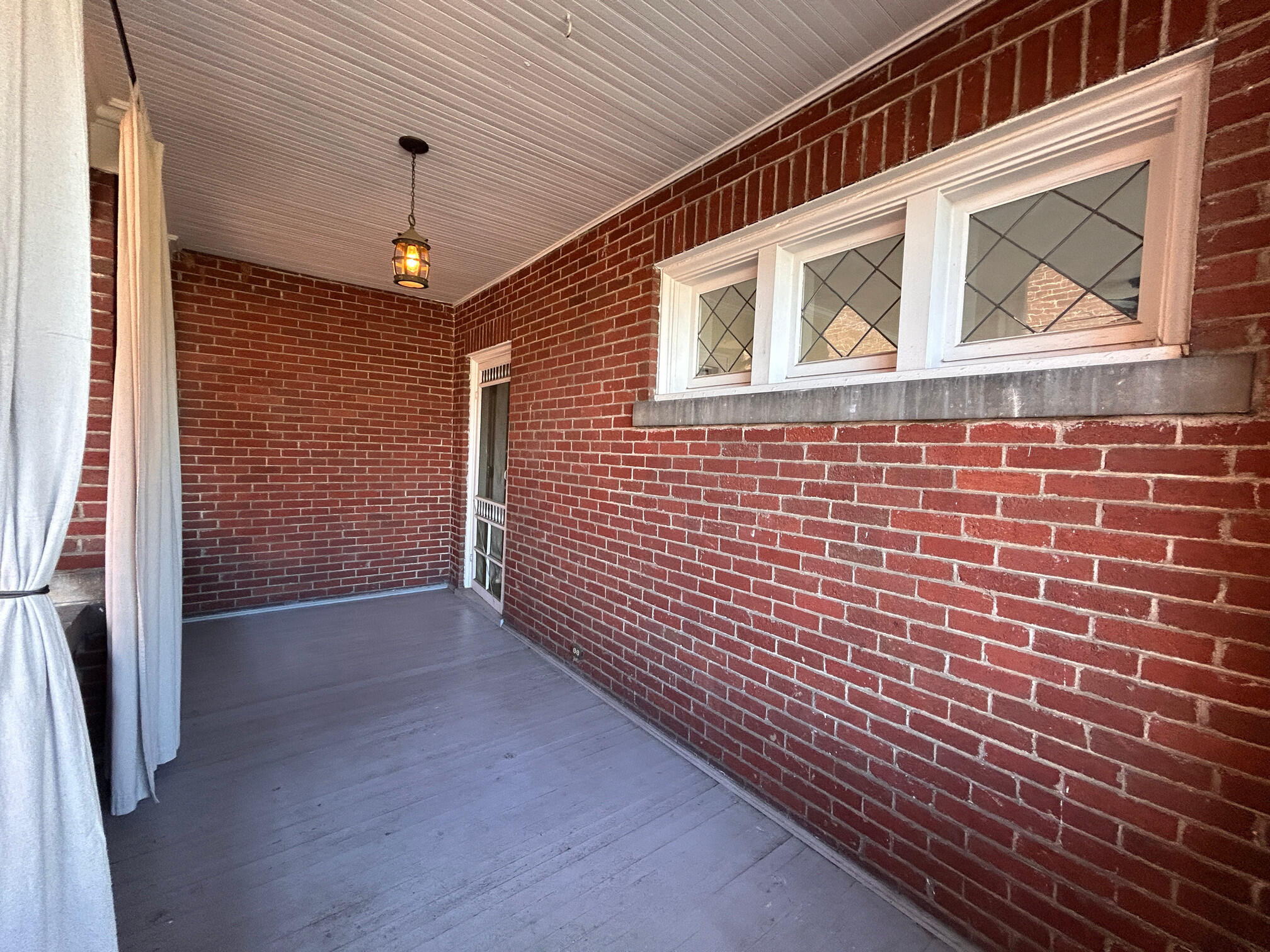 360 Walnut Avenue Southwest, Unit B Roanoke, VA 24016 - Photo 10 of 60 a view of a brick house with a door
