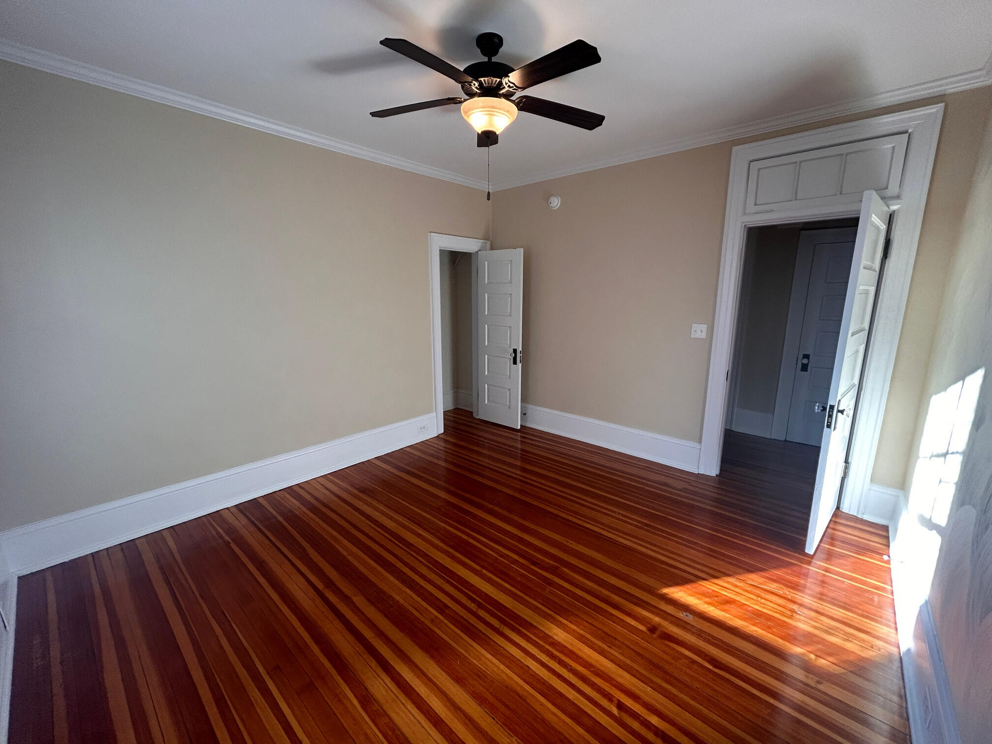 360 Walnut Avenue Southwest, Unit B Roanoke, VA 24016 - Photo 32 of 60 a view of room with wooden floor and a ceiling fan
