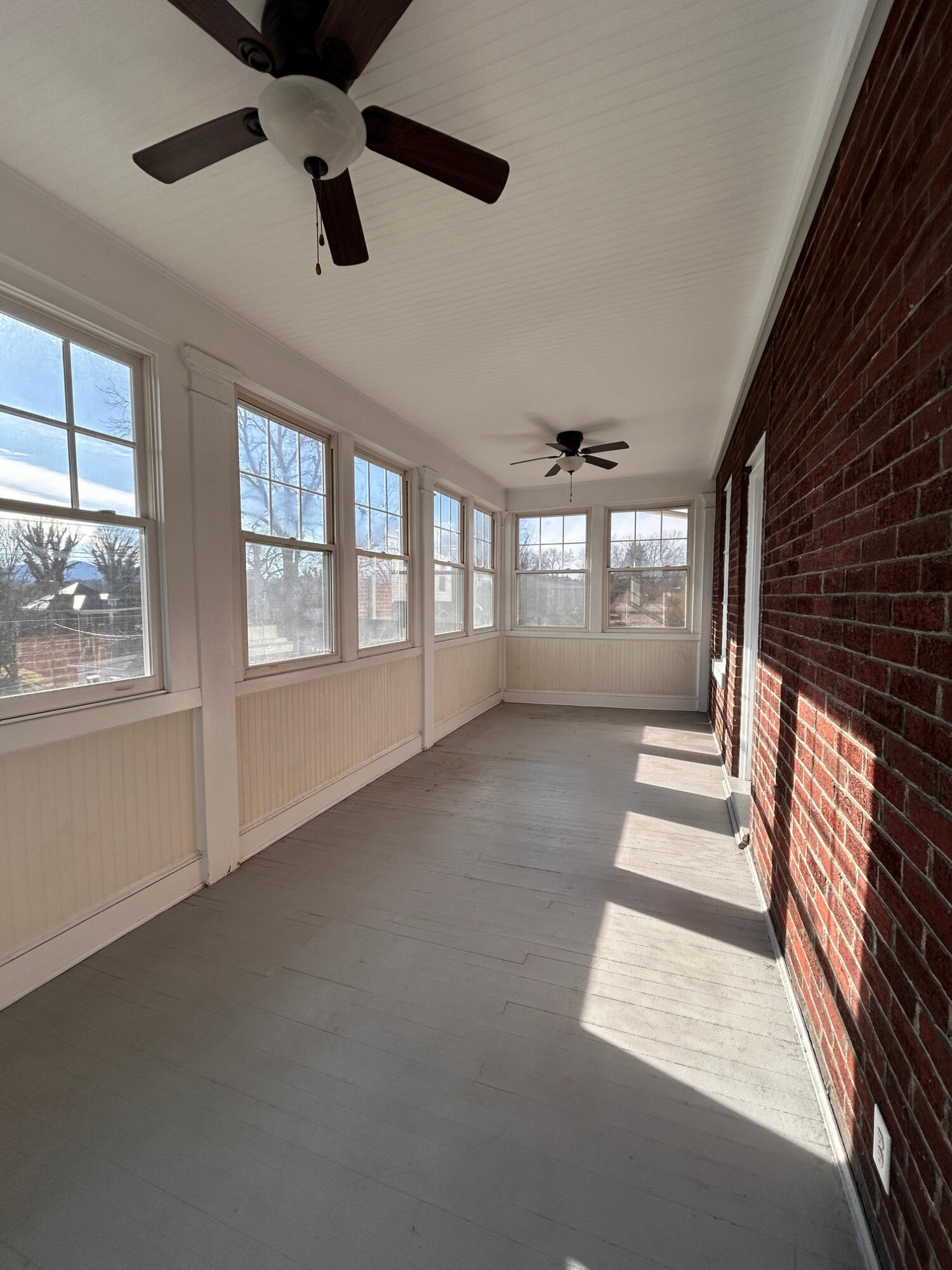 360 Walnut Avenue Southwest, Unit B Roanoke, VA 24016 - Photo 43 of 60 wooden floor in an empty room with a window