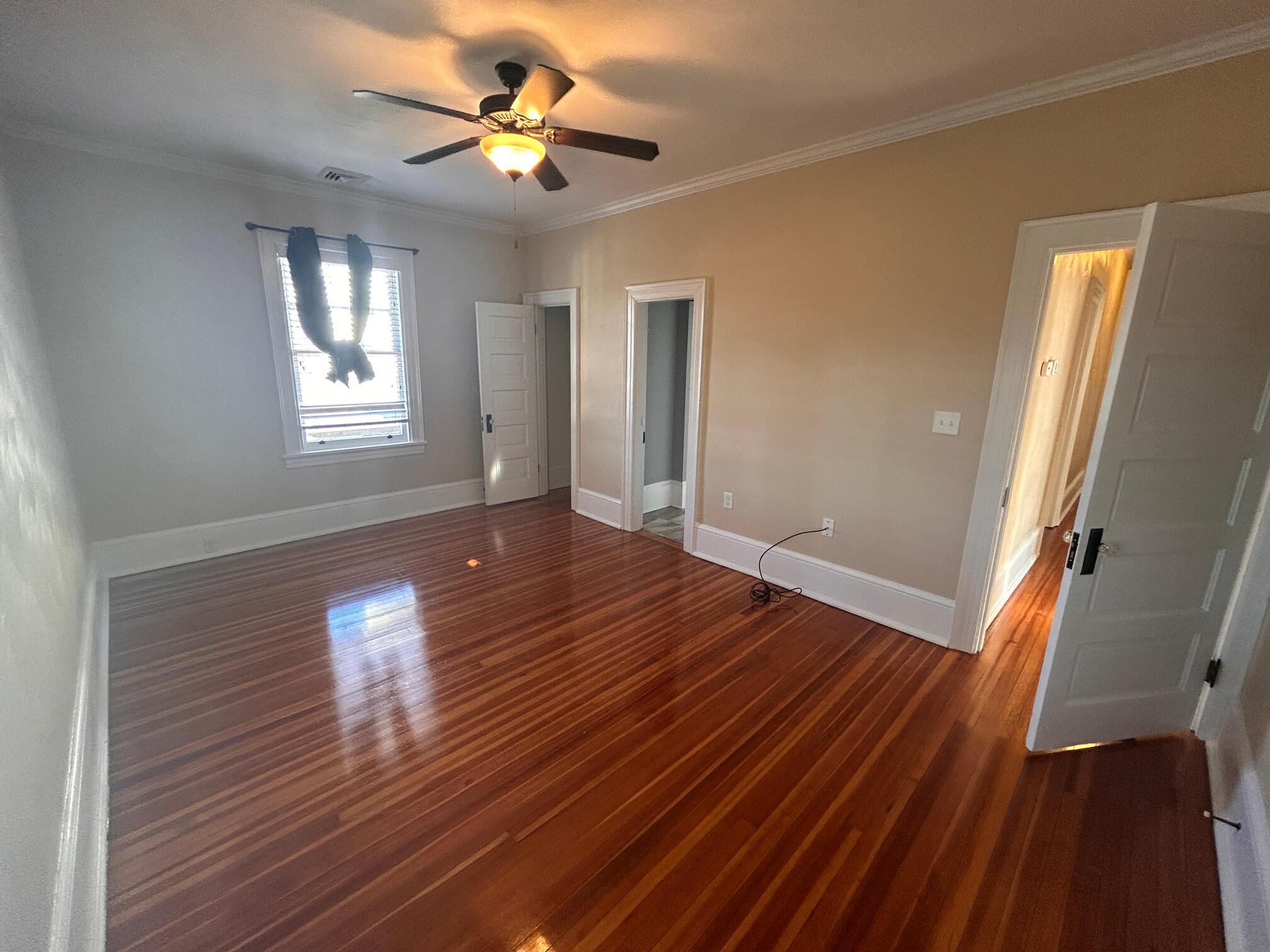 360 Walnut Avenue Southwest, Unit B Roanoke, VA 24016 - Photo 47 of 60 a view of empty room with wooden floor and fan