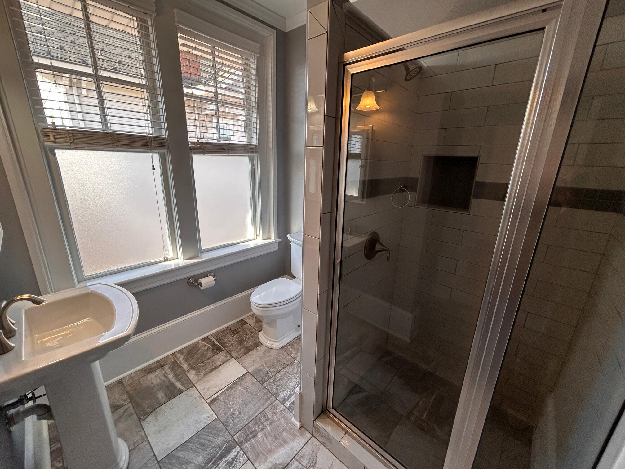 360 Walnut Avenue Southwest, Unit B Roanoke, VA 24016 - Photo 51 of 60 a bathroom with a granite countertop sink toilet and shower