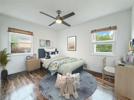 a bed room with a bed and a window