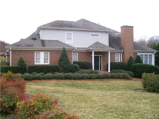 3520 Barron Berkeley Way Raleigh, NC 27612 - Photo 1 of 16 a front view of a house with a yard