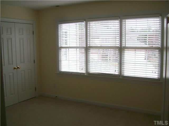 3520 Barron Berkeley Way Raleigh, NC 27612 - Photo 12 of 16 a view of an empty room with a window