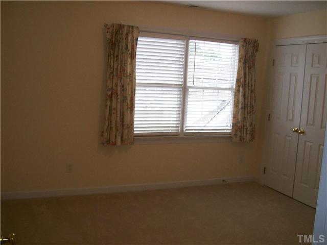 3520 Barron Berkeley Way Raleigh, NC 27612 - Photo 14 of 16 an empty room with a window
