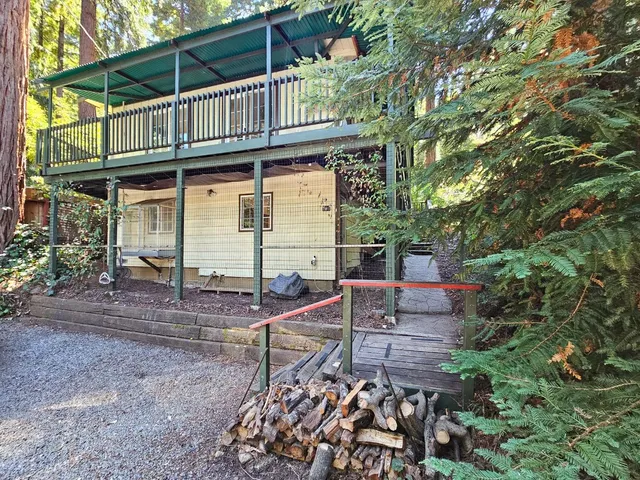 a view of house with outdoor seating space