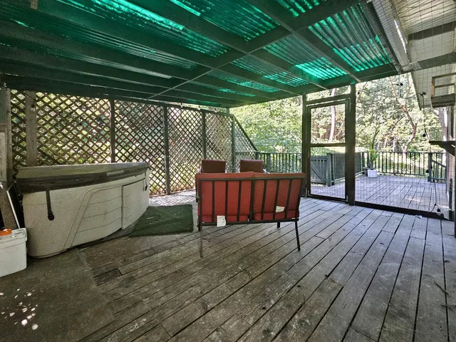 a outdoor living space with furniture and a garden