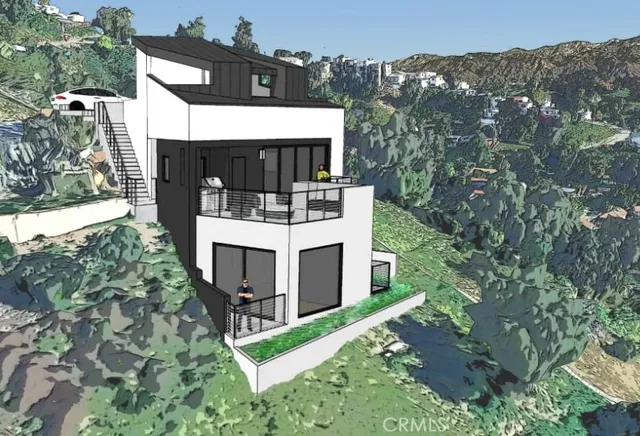 a view of a house with a small yard and large tree