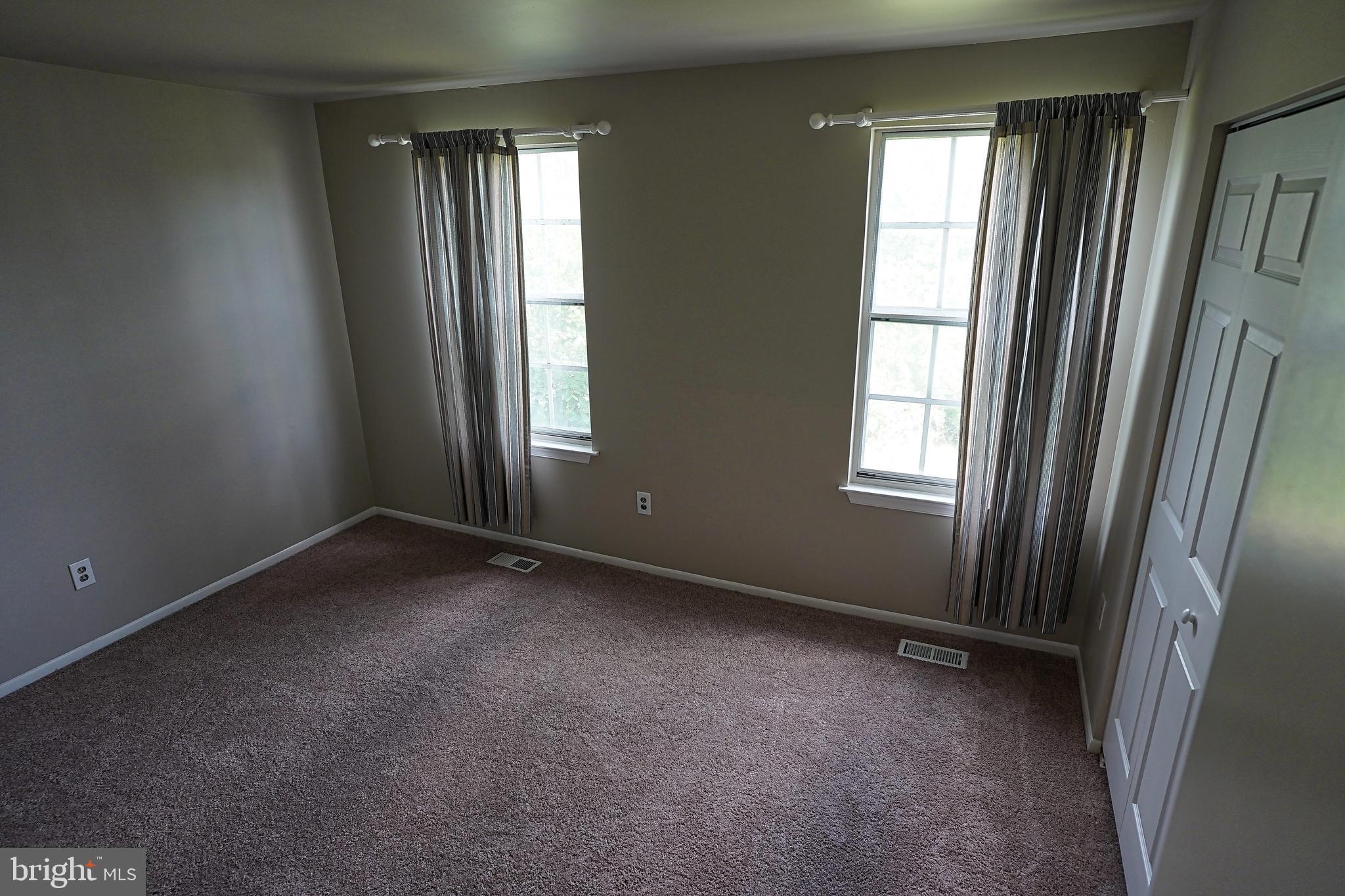 6948 Rockfield Road Baltimore, MD 21244 - Photo 30 of 47 an empty room that has a window in it
