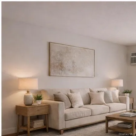 a living room with furniture and a lamp