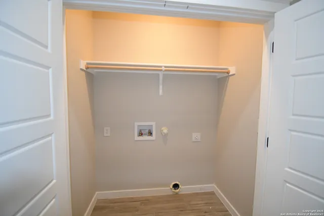 a view of room with window and closet