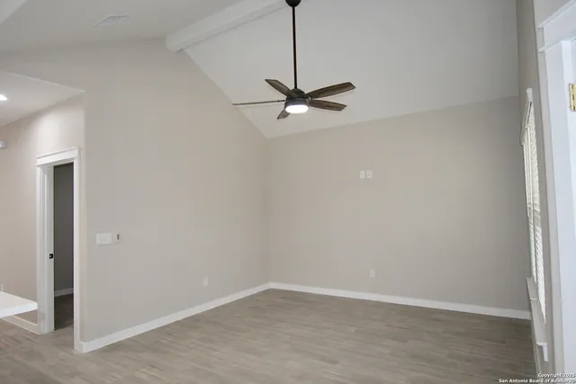 a view of a room with a fan