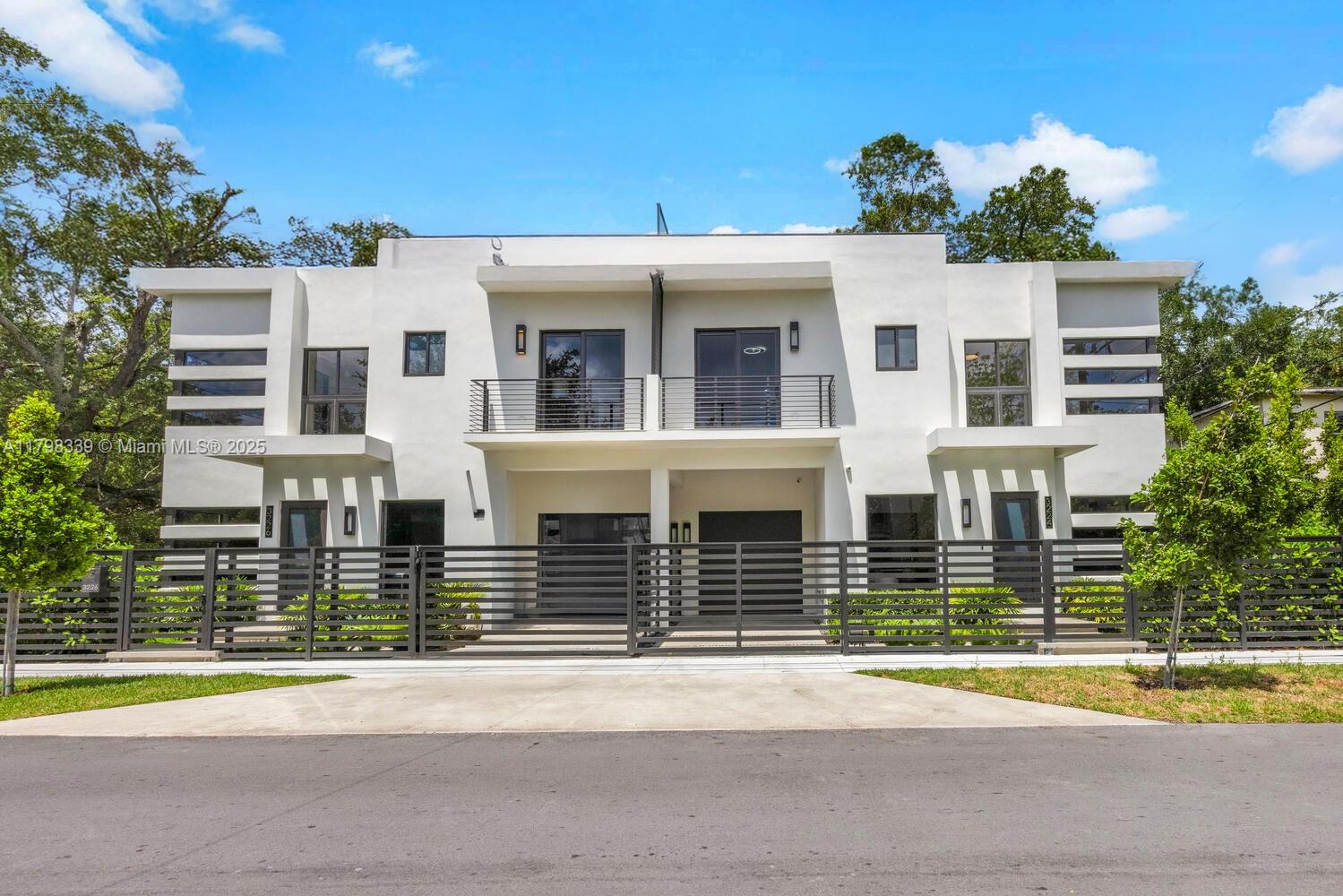 a front view of a house with a swimming pool