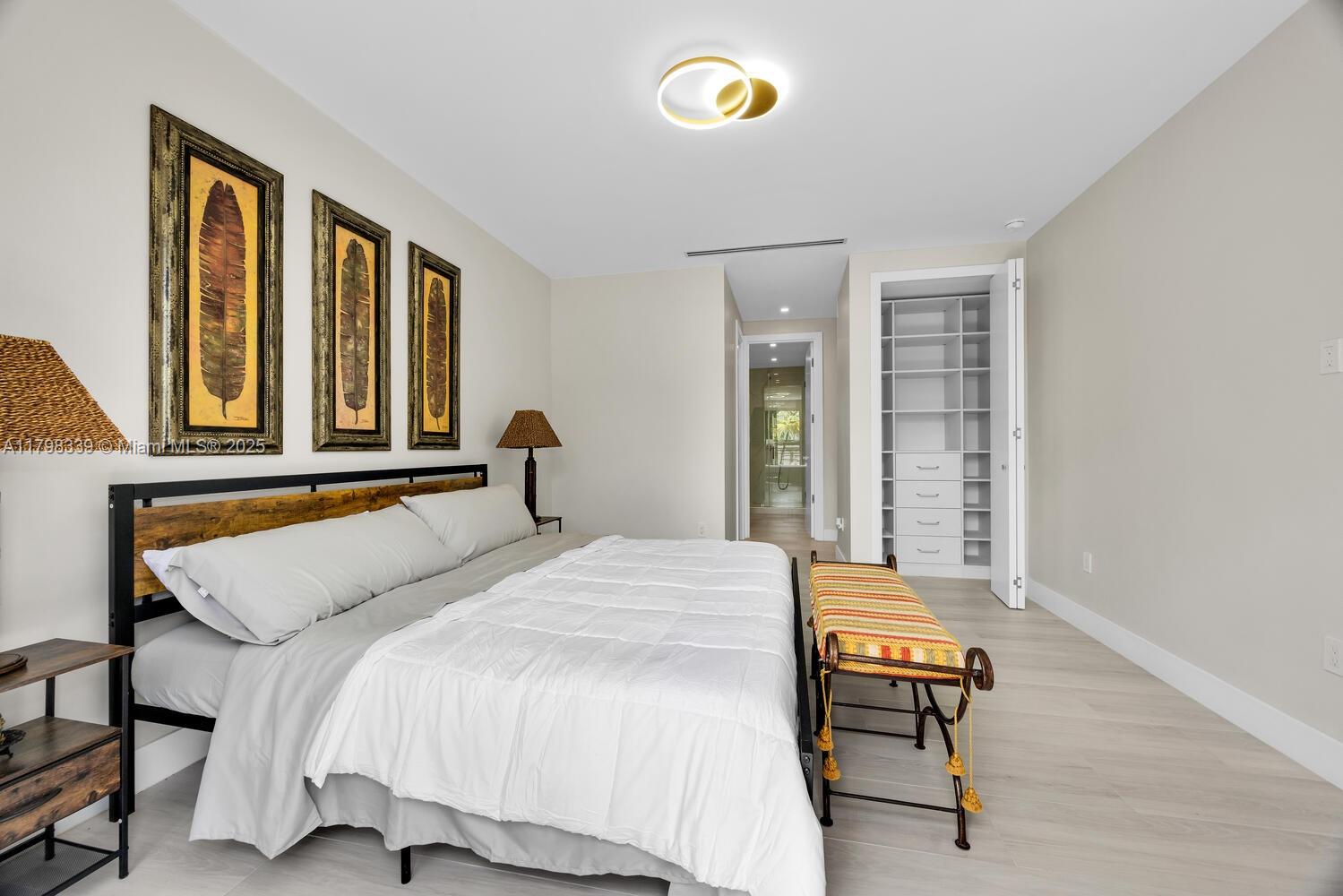 3224 Elizabeth Street Miami, FL 33133 - Photo 14 of 30 a bedroom with a bed and a window