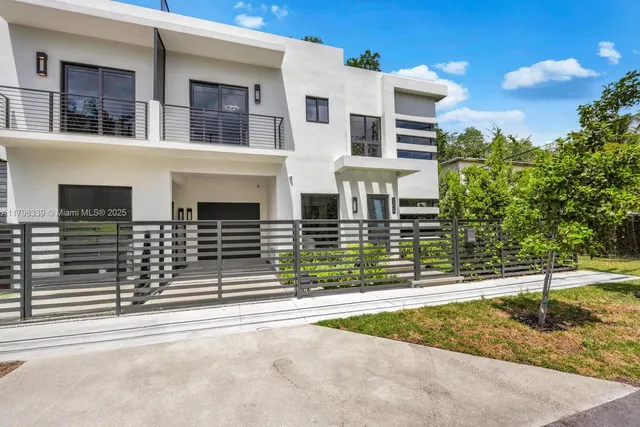 front view of a house with a street