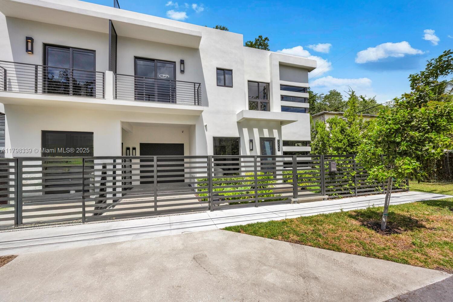 3224 Elizabeth Street Miami, FL 33133 - Photo 2 of 30 front view of a house with a street