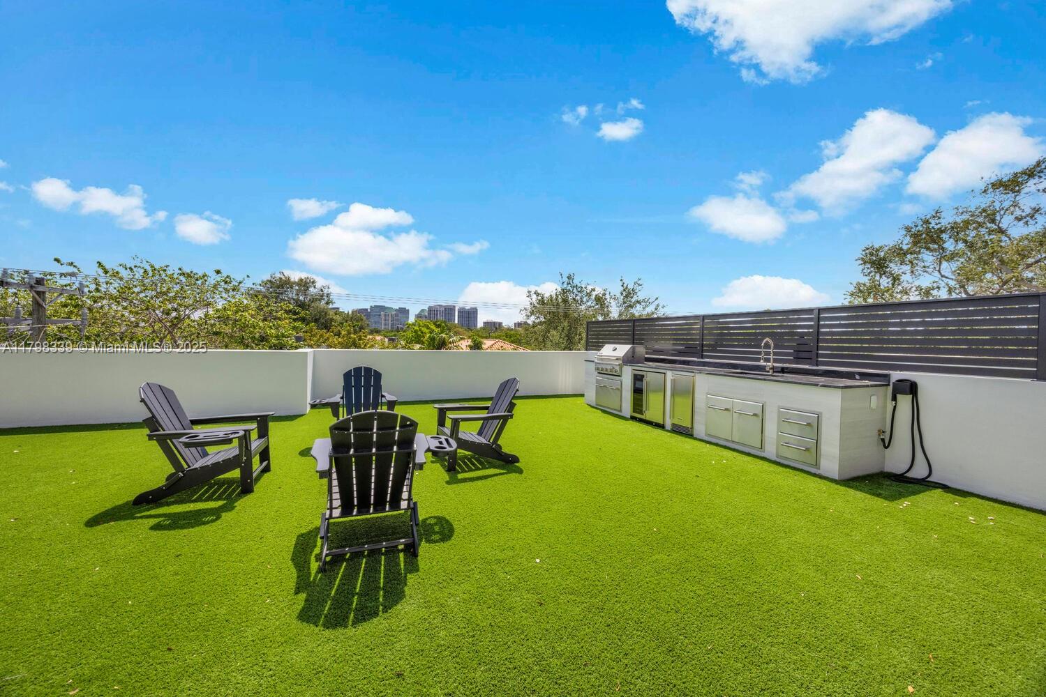 3224 Elizabeth Street Miami, FL 33133 - Photo 25 of 30 a view of a swimming pool with lawn chairs
