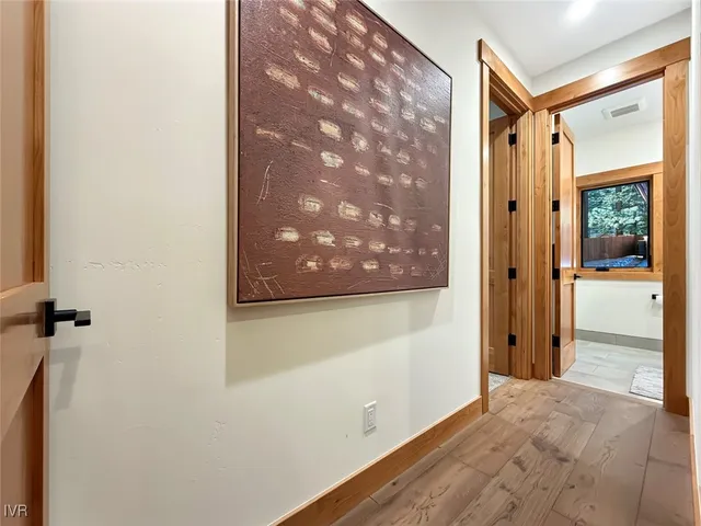 a bathroom with a sink a vanity and a mirror