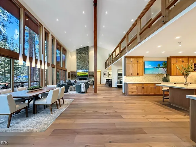 a large kitchen with stainless steel appliances granite countertop a large counter top and stove