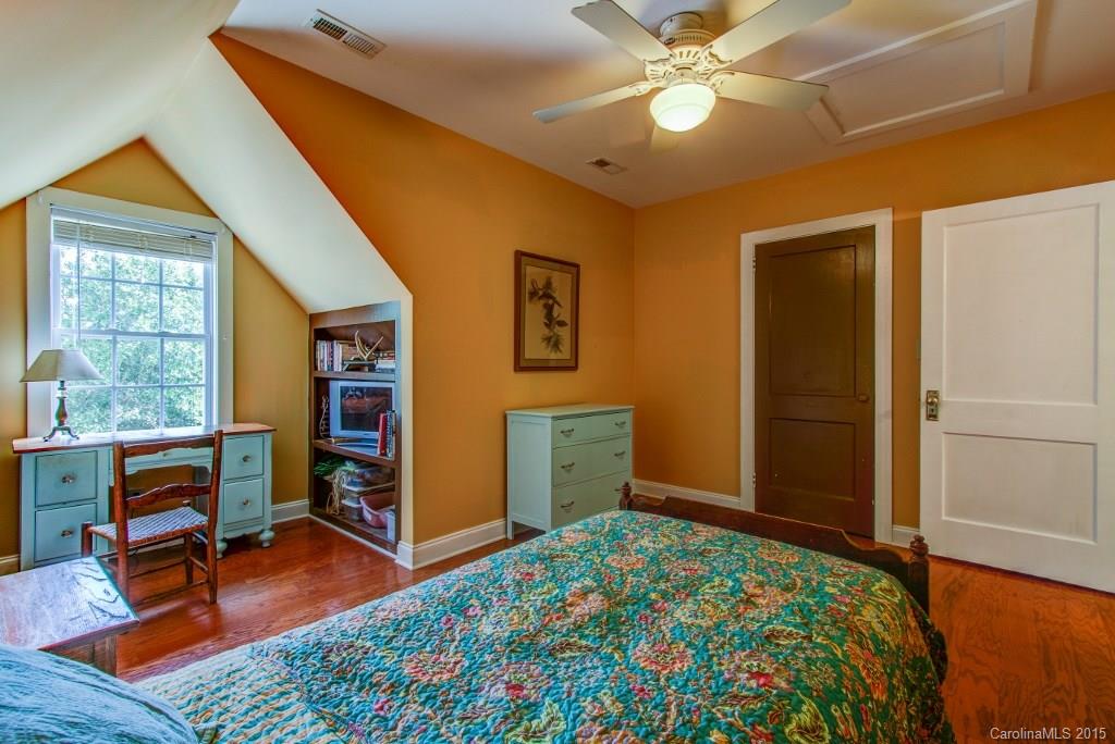 4031 Tite Road Stanfield, NC 28163 - Photo 14 of 24 a bedroom with a bed and a window