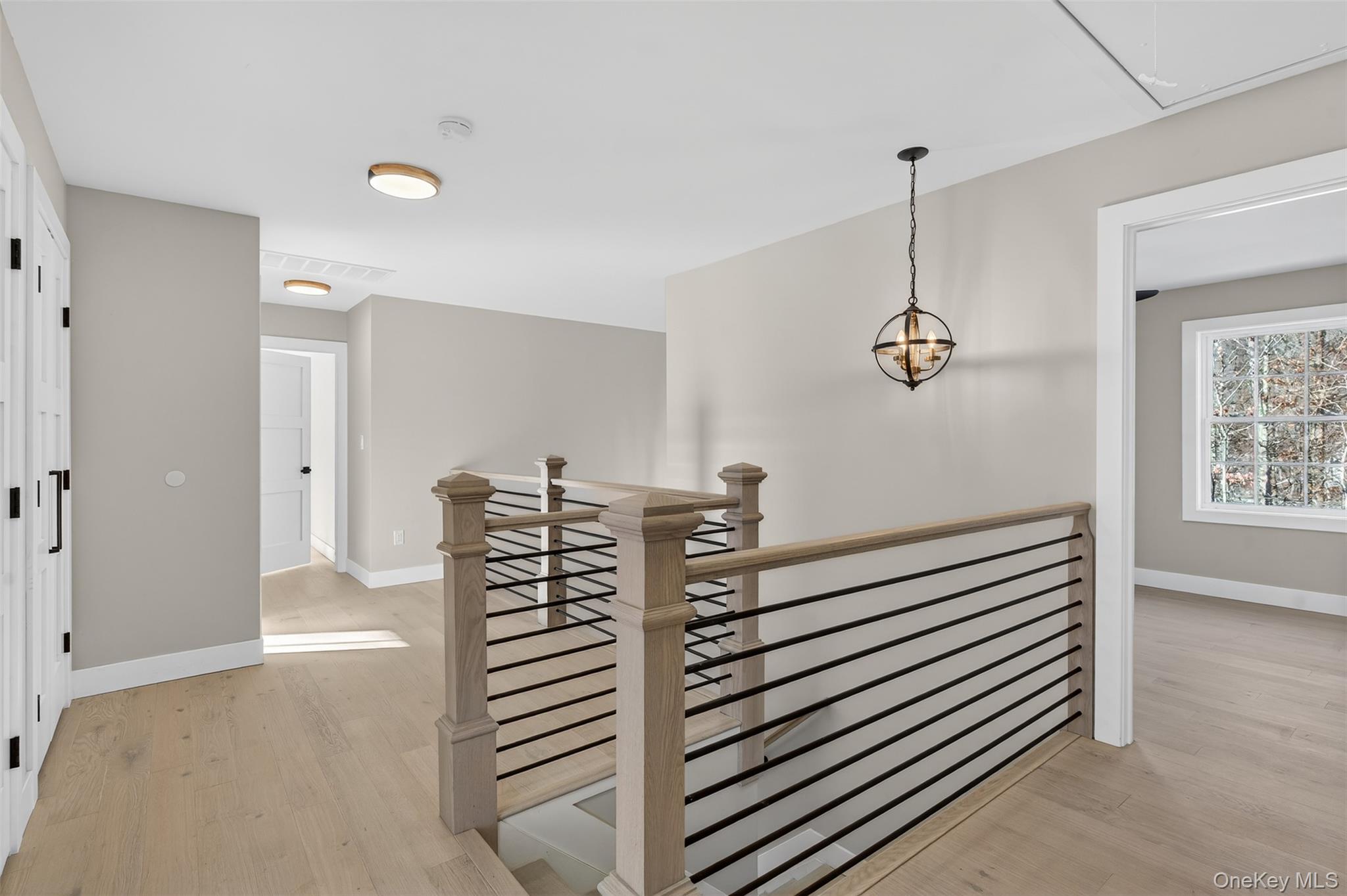 14 Harness Road Goshen, NY 10924 - Photo 22 of 40 Hall featuring an upstairs landing, attic access, and light wood finished floors