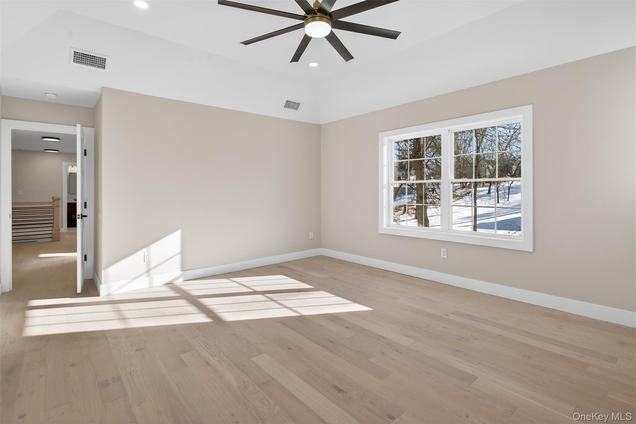 14 Harness Road Goshen, NY 10924 - Photo 29 of 40 Spare room with light wood-style flooring, lofted ceiling, recessed lighting, and a ceiling fan
