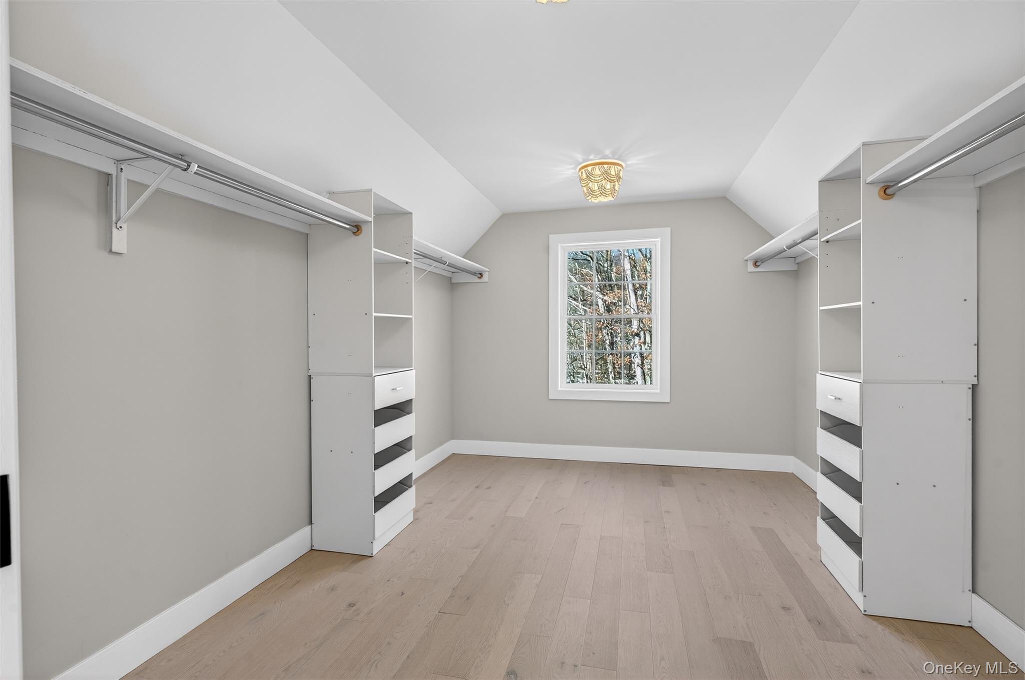 14 Harness Road Goshen, NY 10924 - Photo 34 of 40 Spacious closet with light wood-style flooring and vaulted ceiling