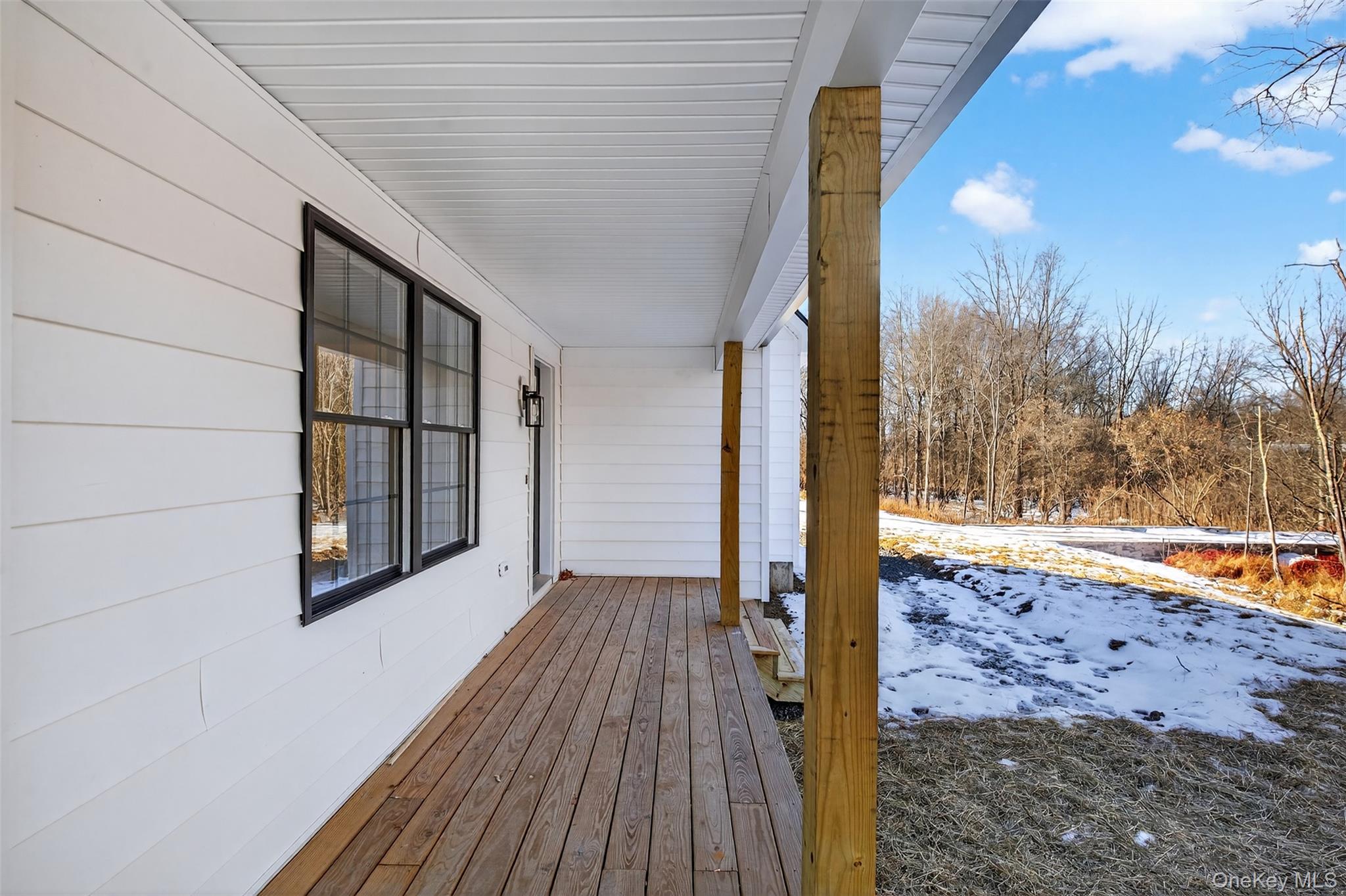 14 Harness Road Goshen, NY 10924 - Photo 7 of 40 Snow covered deck with a porch