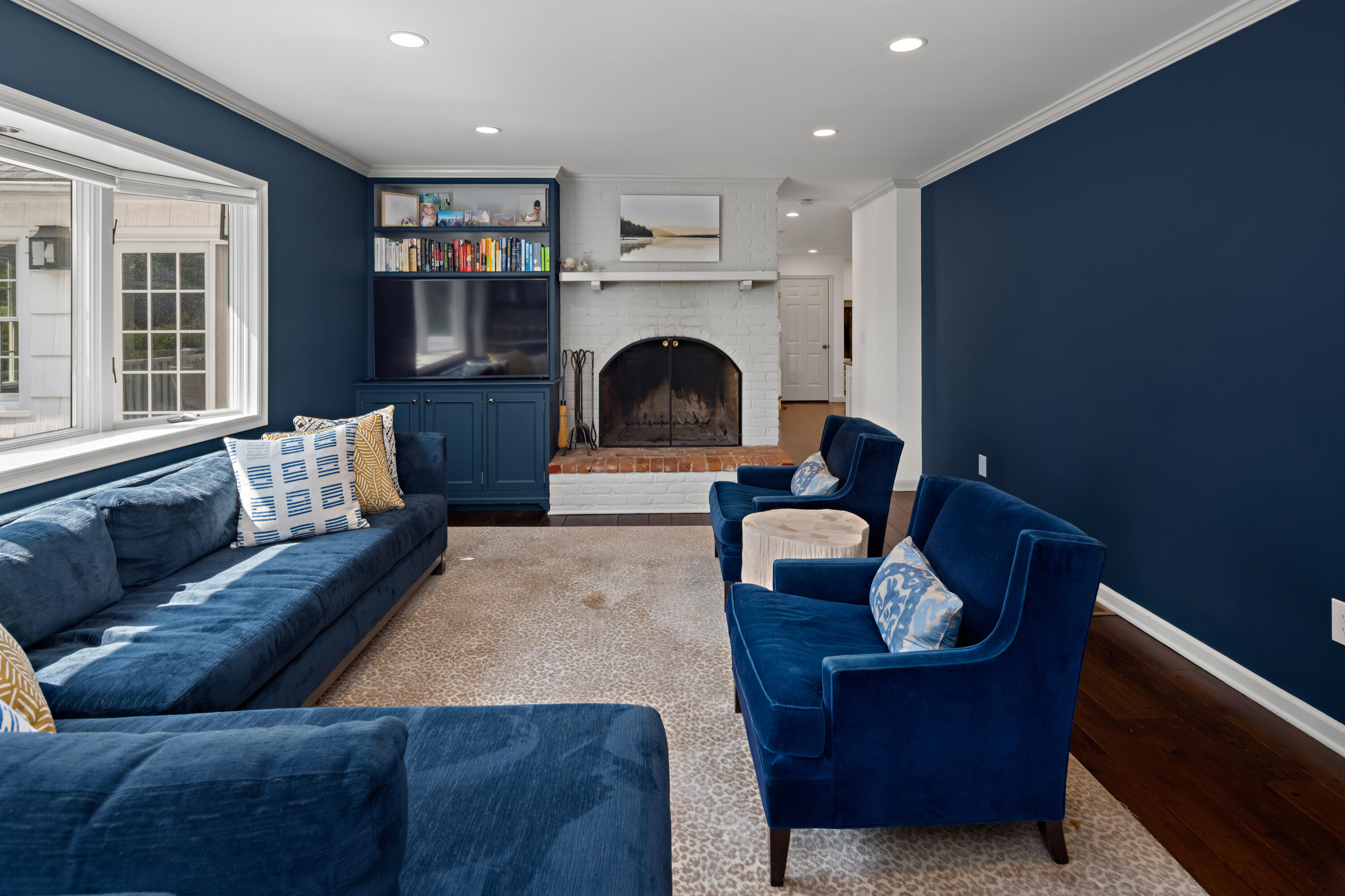 11 Lighthouse Way Darien, CT 06820 - Photo 11 of 25 a living room with furniture and a fireplace
