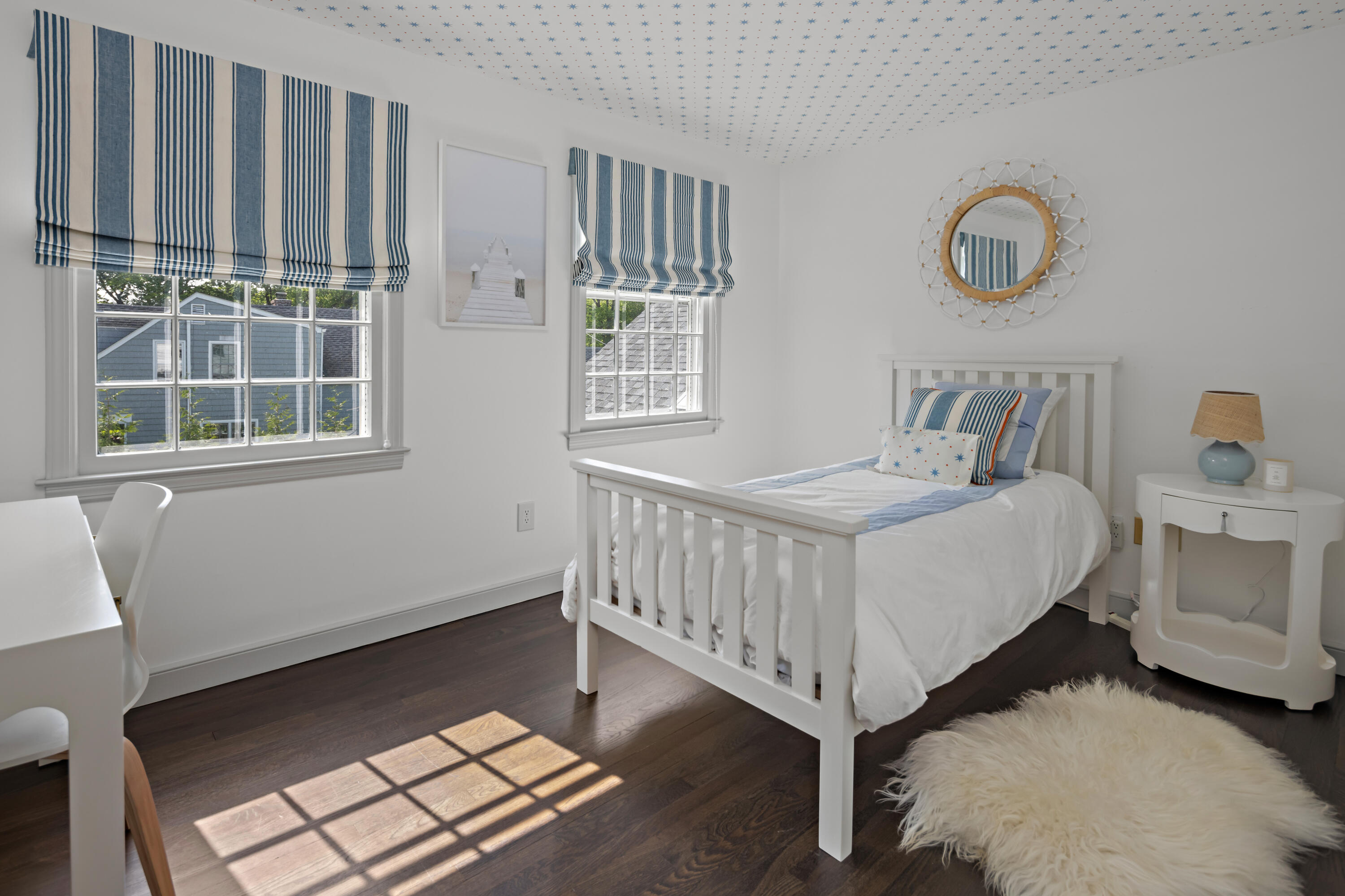 11 Lighthouse Way Darien, CT 06820 - Photo 18 of 25 a bed room with a bed and a window