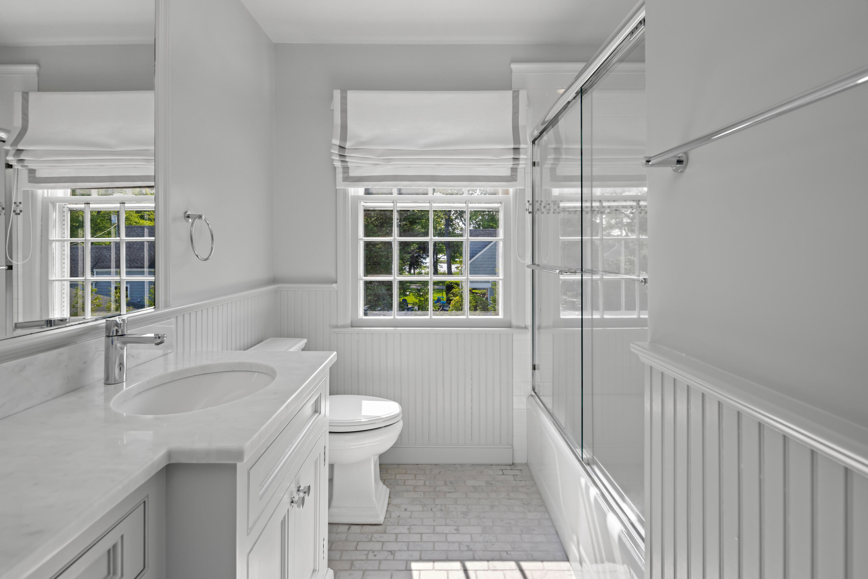 11 Lighthouse Way Darien, CT 06820 - Photo 19 of 25 a bathroom with a sink toilet and shower