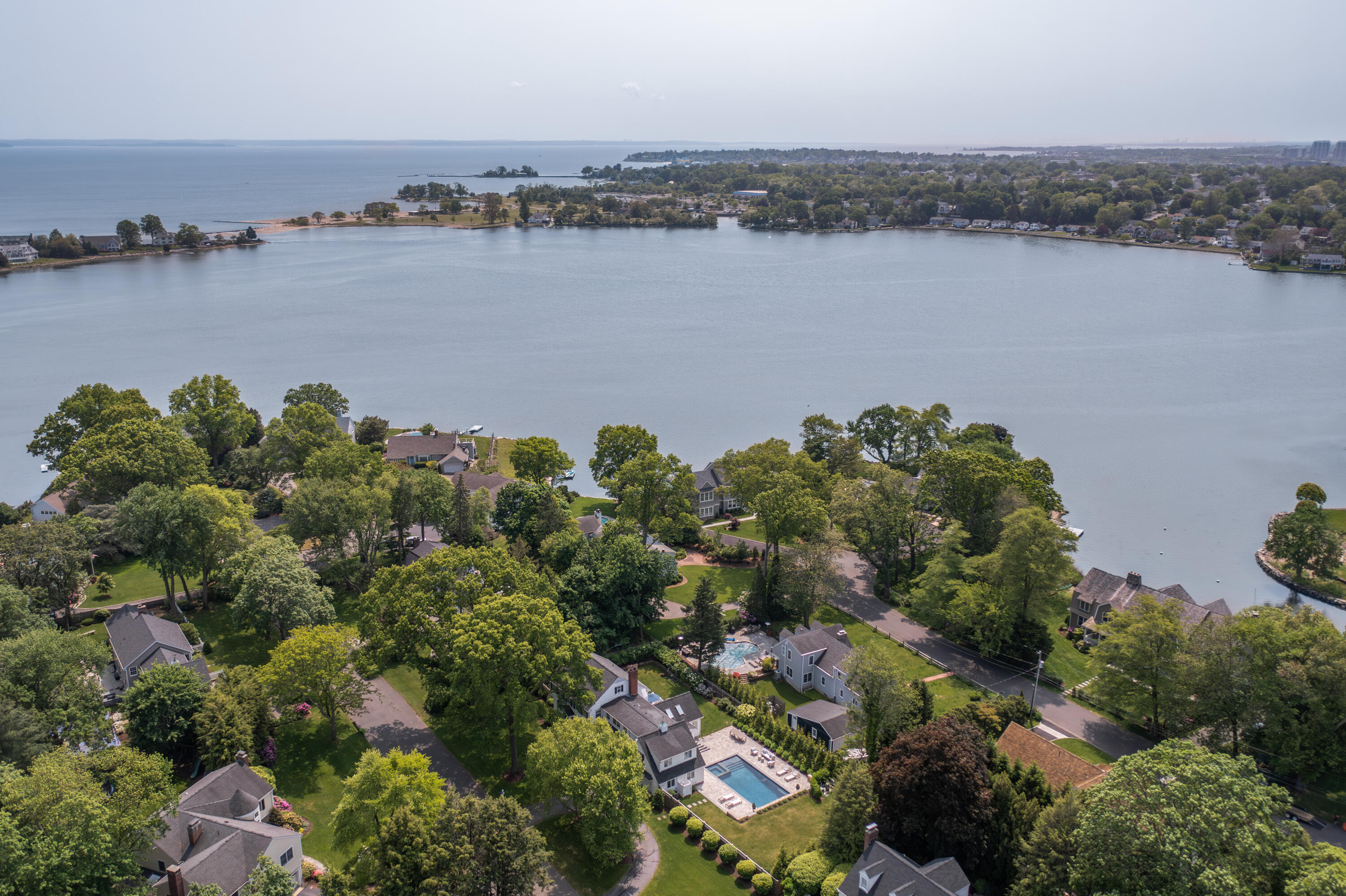 11 Lighthouse Way Darien, CT 06820 - Photo 2 of 25 an aerial view of a houses with a lake view