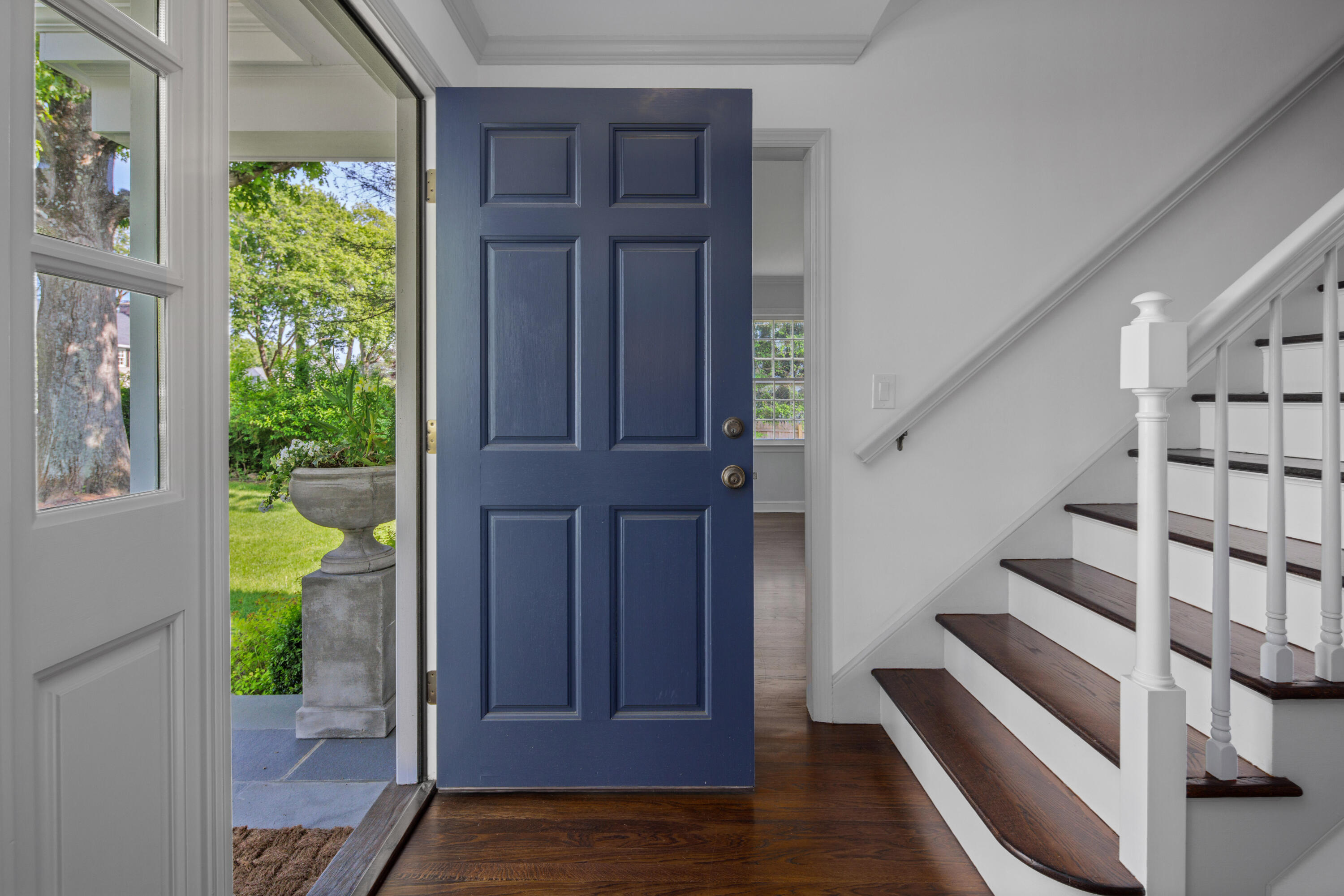 11 Lighthouse Way Darien, CT 06820 - Photo 6 of 25 a view of entryway with wooden floor and a rug