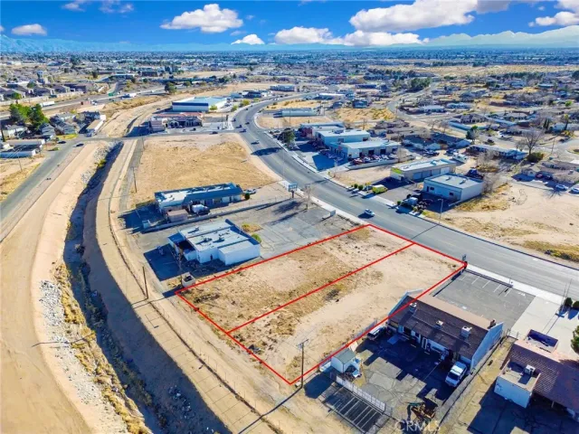 an aerial view of a pool table and chairs