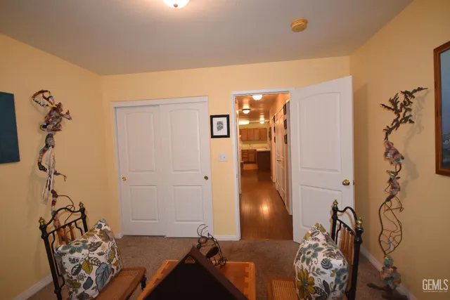 a bedroom with furniture and window