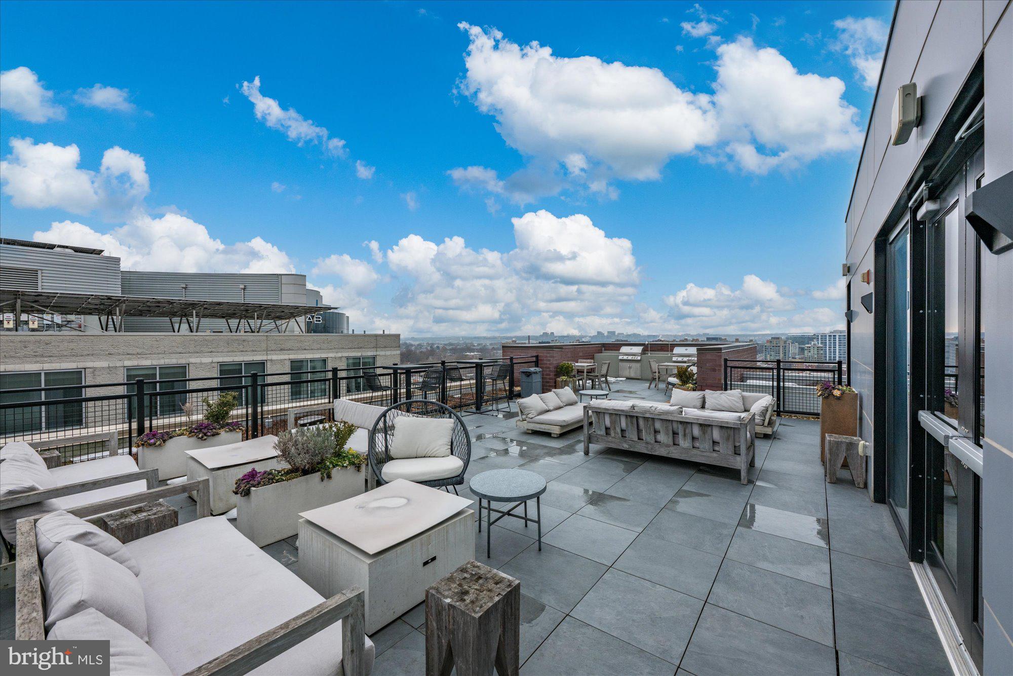 37 L Street Southeast, Unit 1105 Washington, DC 20003 - Photo 14 of 16 a view of a terrace with furniture