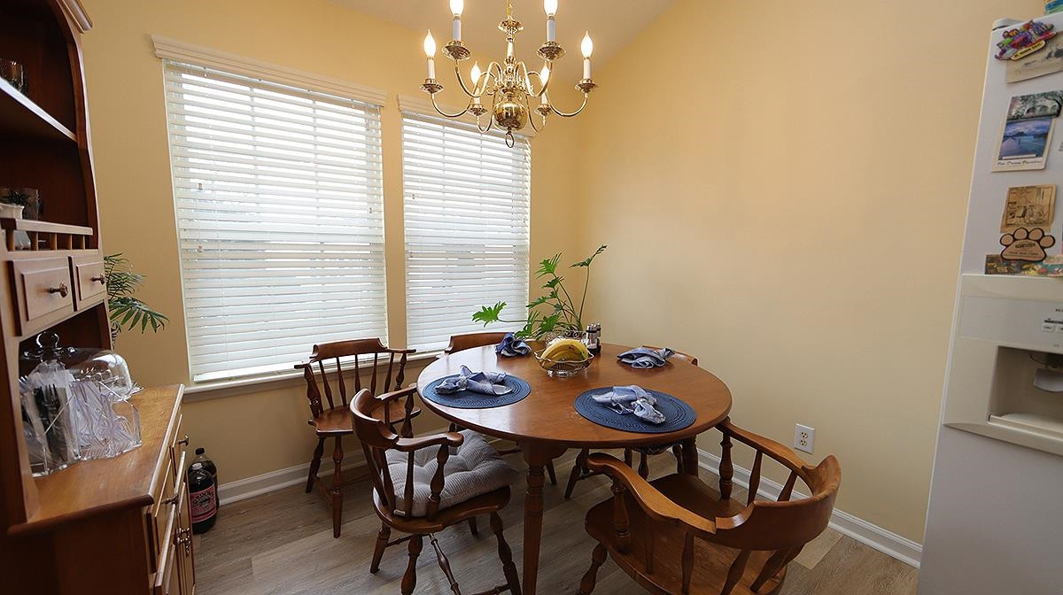 4012 Mardela Spring Drive Raleigh, NC 27616 - Photo 8 of 17 Eat-In Kitchen with double window dining area. Dining Area
