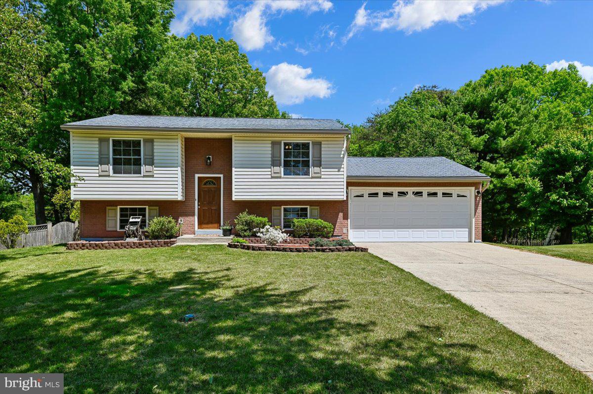 1928 Canonchet Court Hanover, MD 21076 - Photo 1 of 32 a front view of house with yard and green space