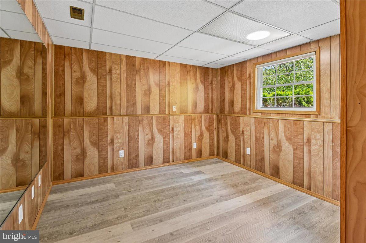 1928 Canonchet Court Hanover, MD 21076 - Photo 22 of 32 a view of wooden floor with windows