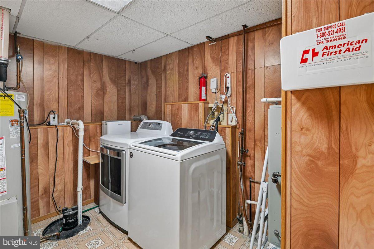 1928 Canonchet Court Hanover, MD 21076 - Photo 26 of 32 a utility room with dryer and washer