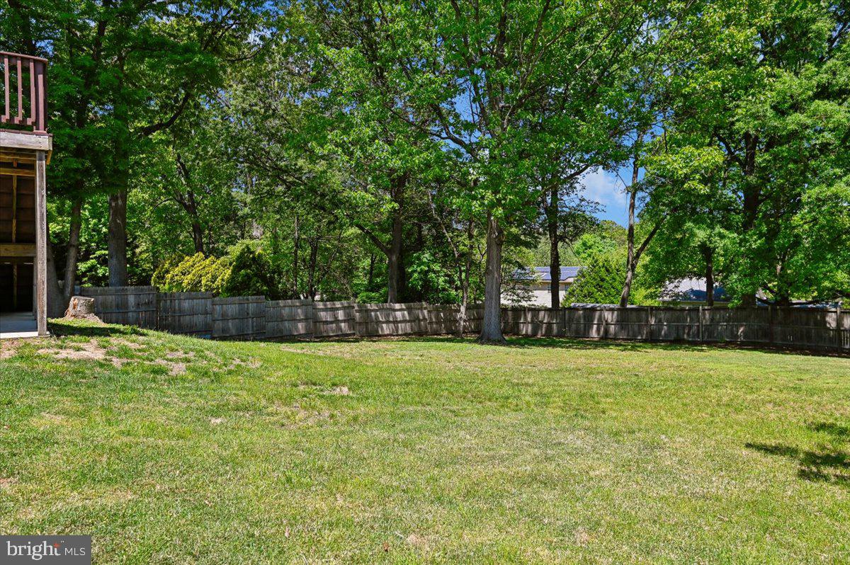 1928 Canonchet Court Hanover, MD 21076 - Photo 28 of 32 a swimming pool with trees in the background