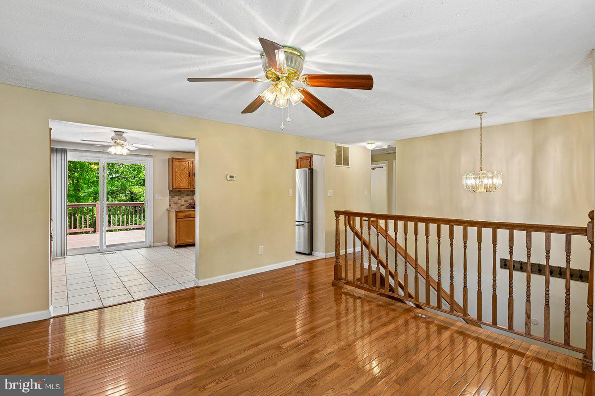 1928 Canonchet Court Hanover, MD 21076 - Photo 3 of 32 a view of entryway and hall with wooden floor