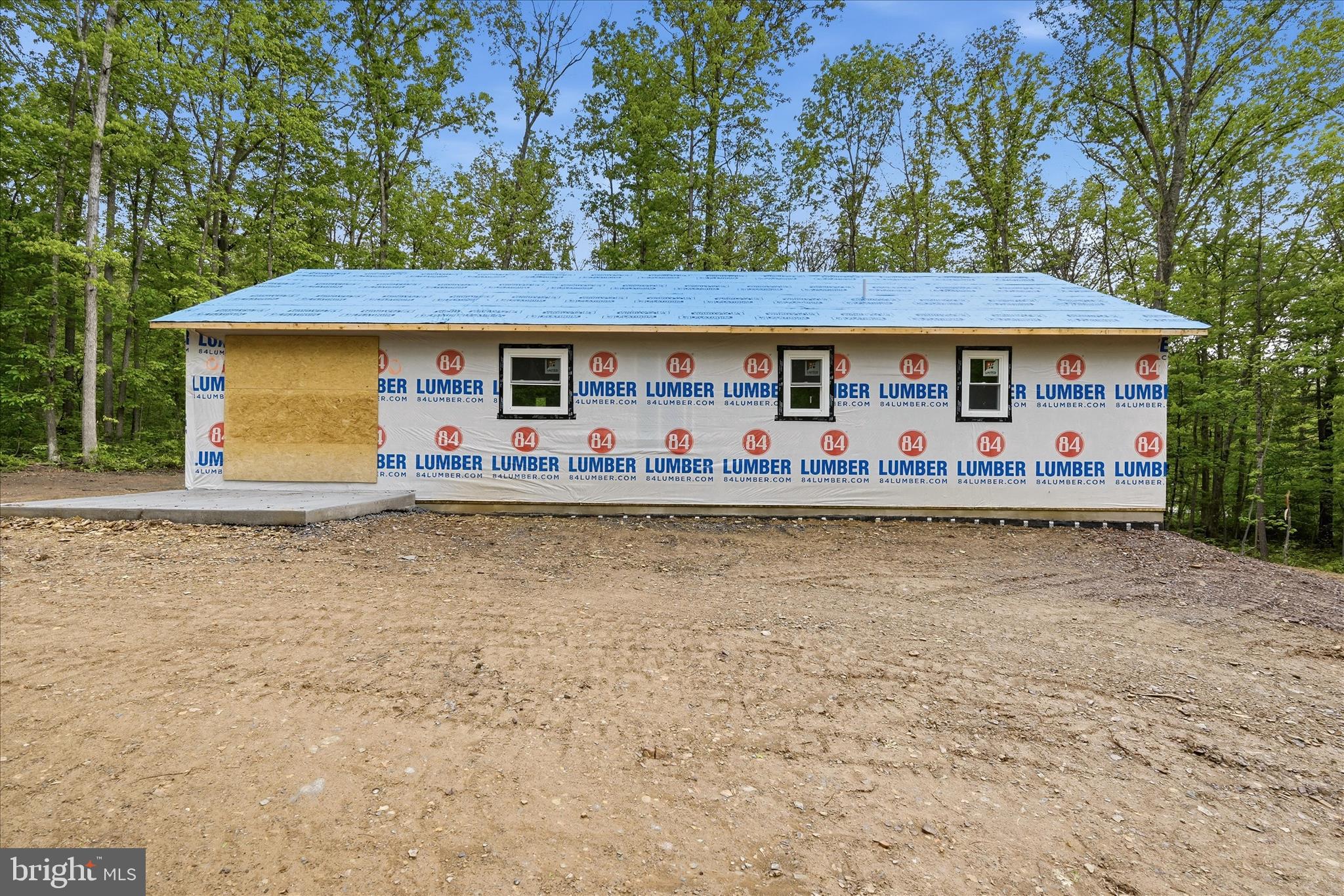 249 Cub Road Wardensville, WV 26851 - Photo 12 of 16 a front view of house with yard space and yard