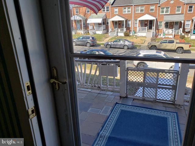 1069 Elm Road Halethorpe, MD 21227 - Photo 1 of 14 front porch