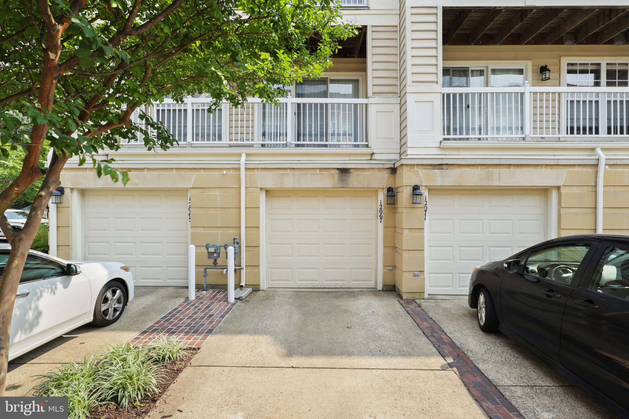 12067 Trumbull Way Reston, VA 20190 - Photo 44 of 67 Garage / Driveway