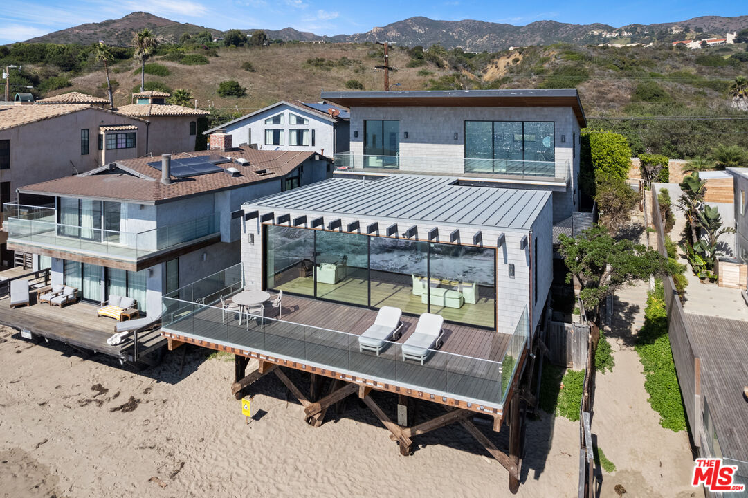 24604 Malibu Road Malibu, CA 90265 - Photo 14 of 17 an aerial view of a house with a big yard